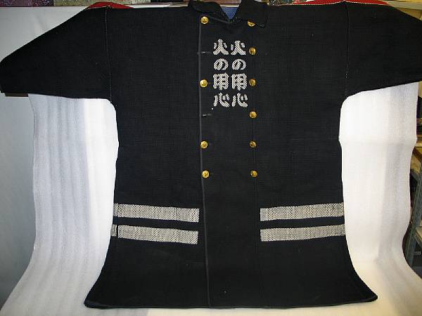 Appraisal: A Japanese handwoven double breasted fireman's coat Of dark blue