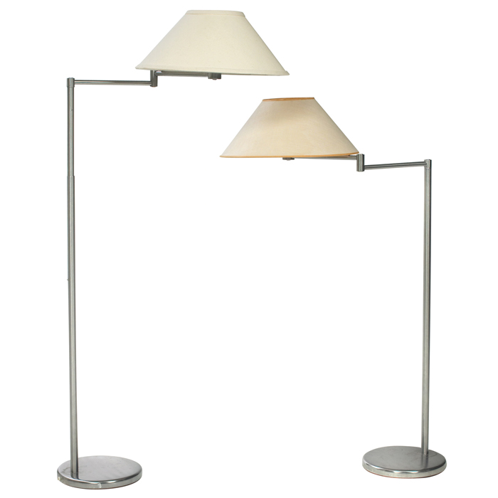 Appraisal: Nessen floor lamps pair brushed steel each with adjustable arm