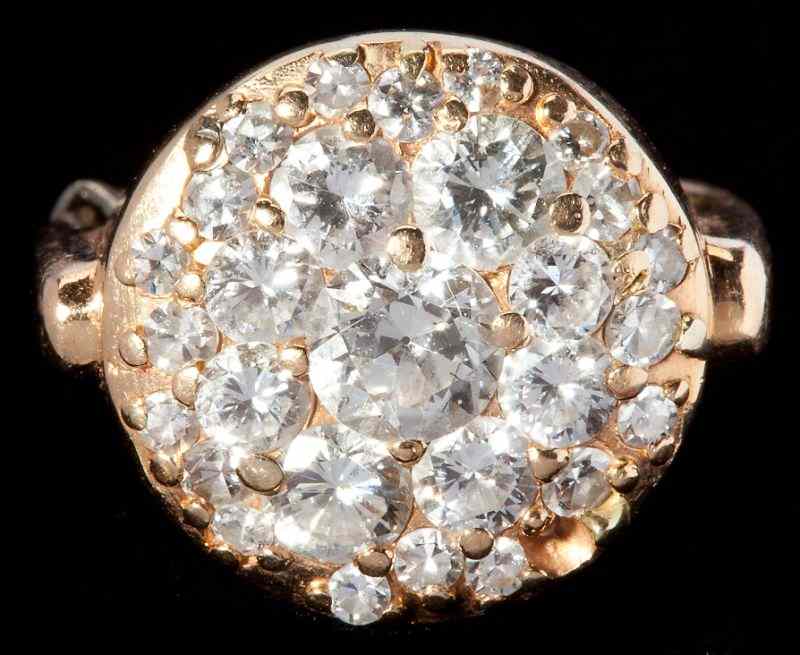 Appraisal: Lady's Diamond Cluster Ringcentering on one round brilliant cut diamond