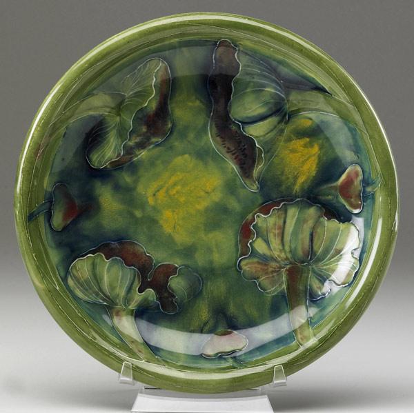 Appraisal: MOORCROFT Plate in the Claremont design on green ground Signed