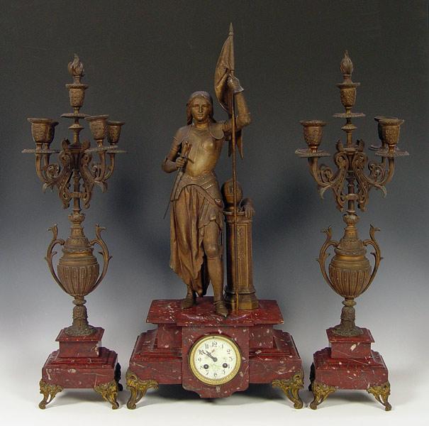 Appraisal: FIGURAL JOAN OF ARC FRENCH CLOCK GARNITURE SET Cast figural