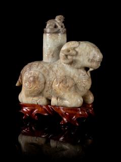 Appraisal: A Chicken Bone Jade Archaistic Ram-Form Vessel the creamy stone