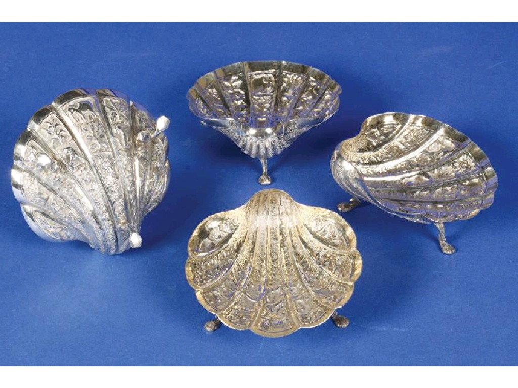 Appraisal: A SET OF FOUR INDIAN SCALLOP SHELL DISHES with gilt