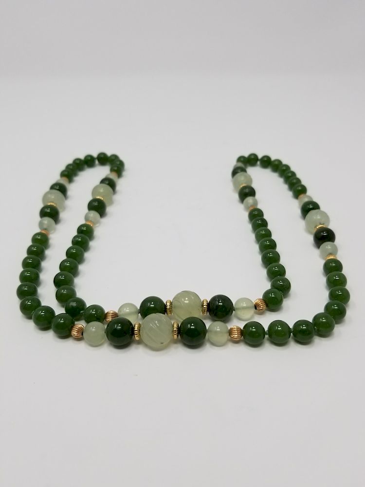 Appraisal: Carved Green Stone Gold Necklace Carved Green Stone Gold Necklace