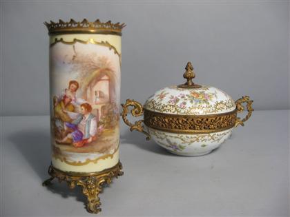 Appraisal: Two Sevres style gilt metal mounted porcelain table articlesComprising cylindrical