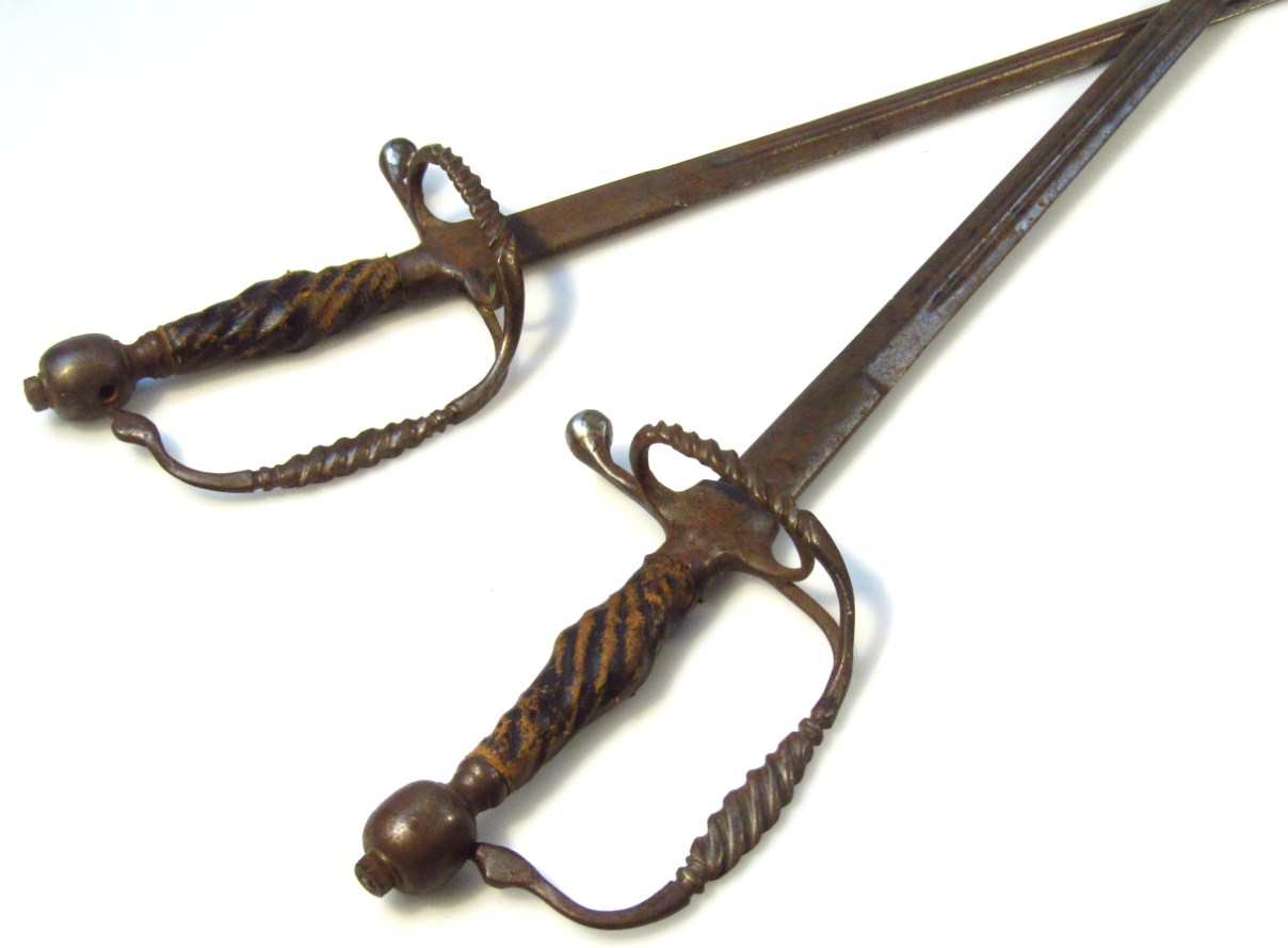 Appraisal: Two similar Continental swords each with a leather handle cm