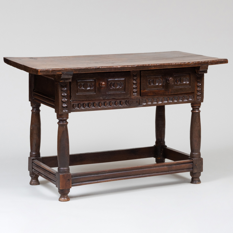 Appraisal: CONTINENTAL RUSTIC CARVED WALNUT TABLE x x in Condition Several