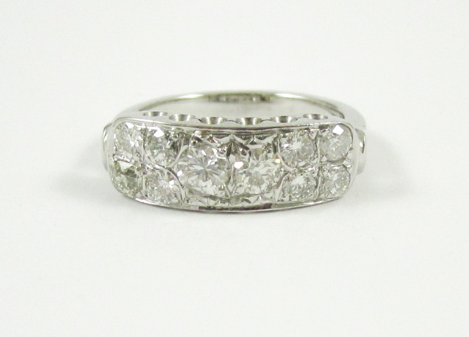 Appraisal: DIAMOND AND EIGHTEEN KARAT WHITE GOLD RING set with ten