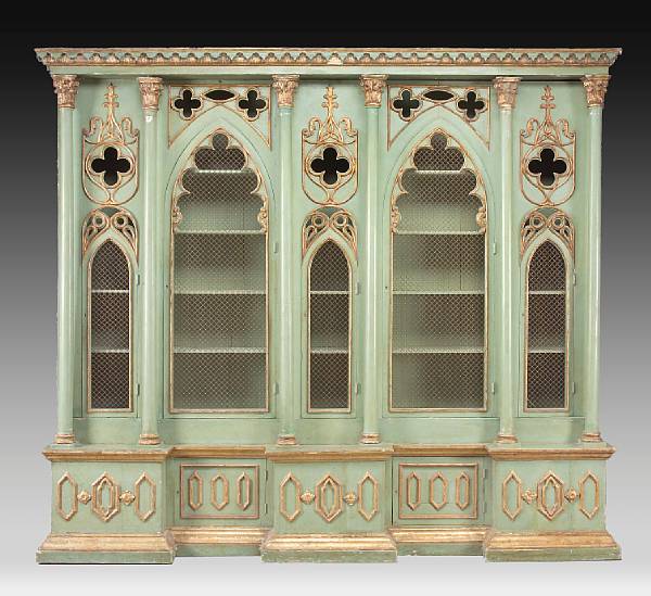 Appraisal: An Italian Gothic Revival painted and parcel gilt cabinet partially