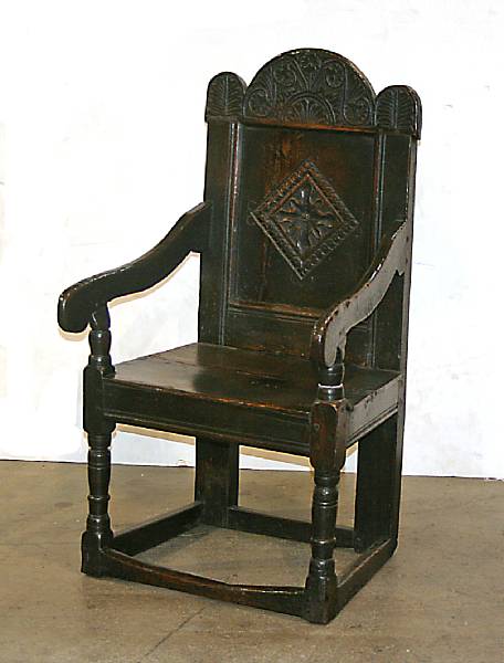 Appraisal: A Charles II oak wainscot armchair height in width in