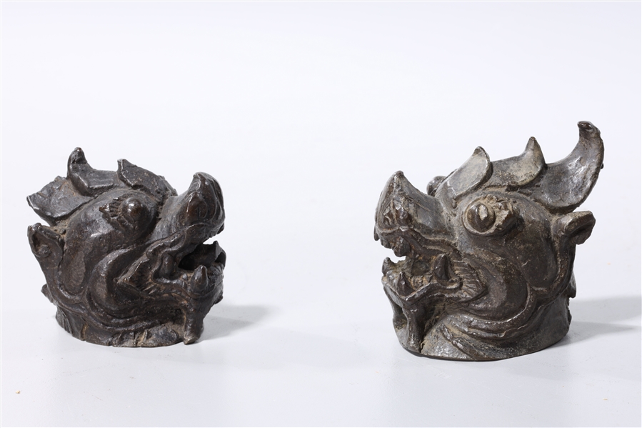 Appraisal: Pair of Southeast Asian bronze lion head opium weights x