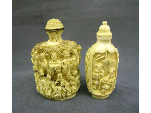 Appraisal: Two antique oriental snuff bottles one bone damaged and repaired