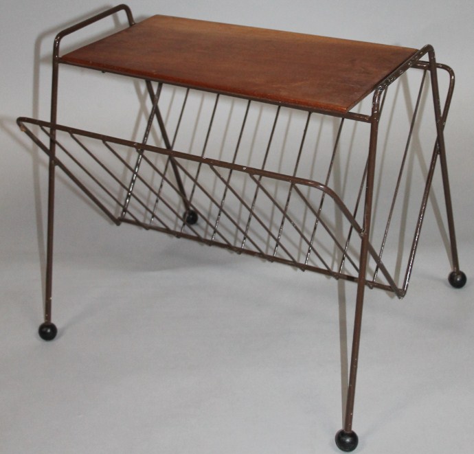 Appraisal: A 's retro teak and wirework newspaper rack of shaped