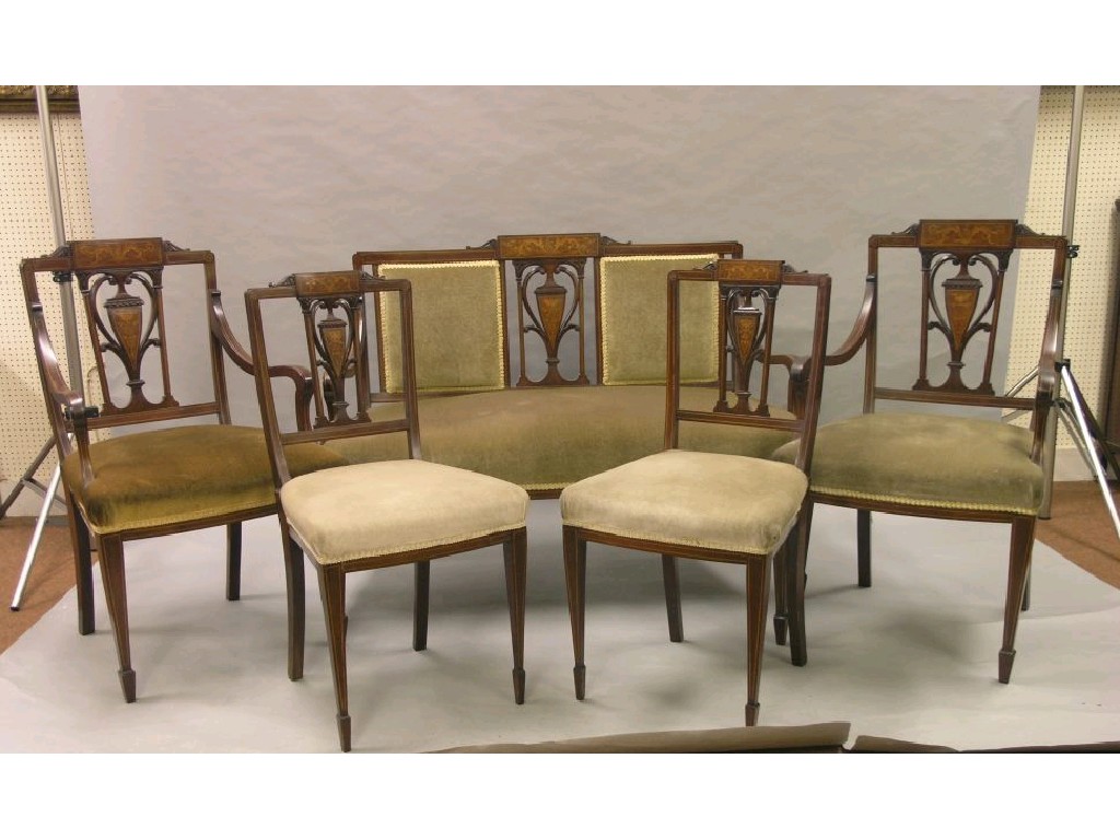 Appraisal: An Edwardian inlaid mahogany drawing-room suite consisting of two seater