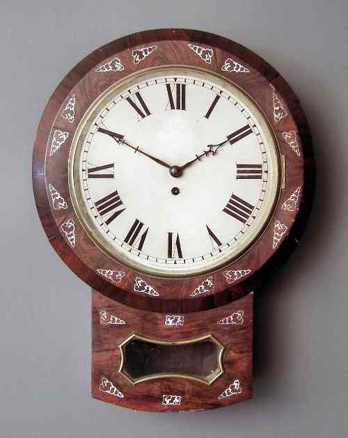 Appraisal: A Victorian rosewood cased drop dial wall clock the ins