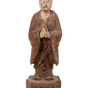 Appraisal: A Chinese Carved and Polychrome Decorated Wood Figure in Prayer