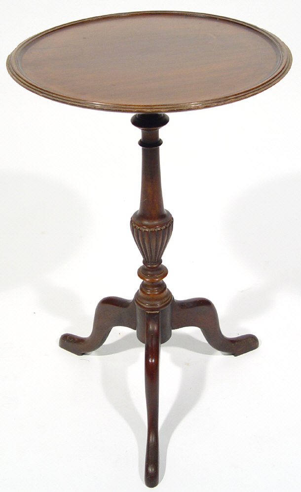 Appraisal: Mahogany wine table the circular dished top supported by a