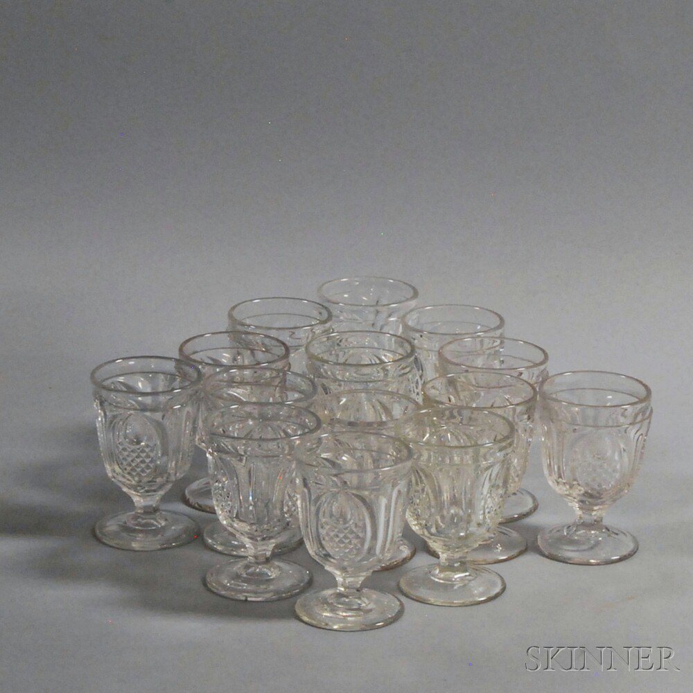 Appraisal: Set of Fourteen Colorless Pattern Glass Pineapple Wines probably New