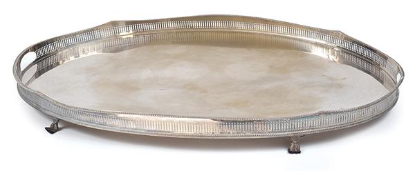 Appraisal: A LARGE OVAL SILVER PLATE GALLERY EDGED TRAY raised on