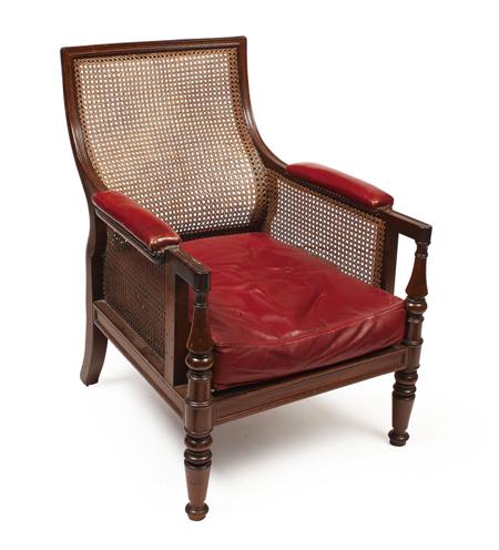 Appraisal: REGENCY MAHOGANY AND LEATHER UPHOLSTERED LIBRARY ARMCHAIR CIRCA the caned