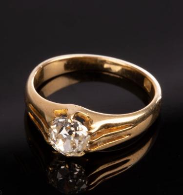 Appraisal: A diamond solitaire ring the cushion-shaped stone claw set to