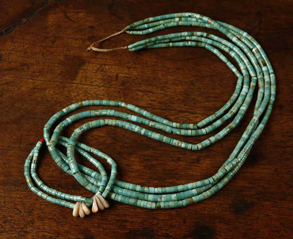 Appraisal: A Navajo triple strand turquoise necklace A Navajo triple strand