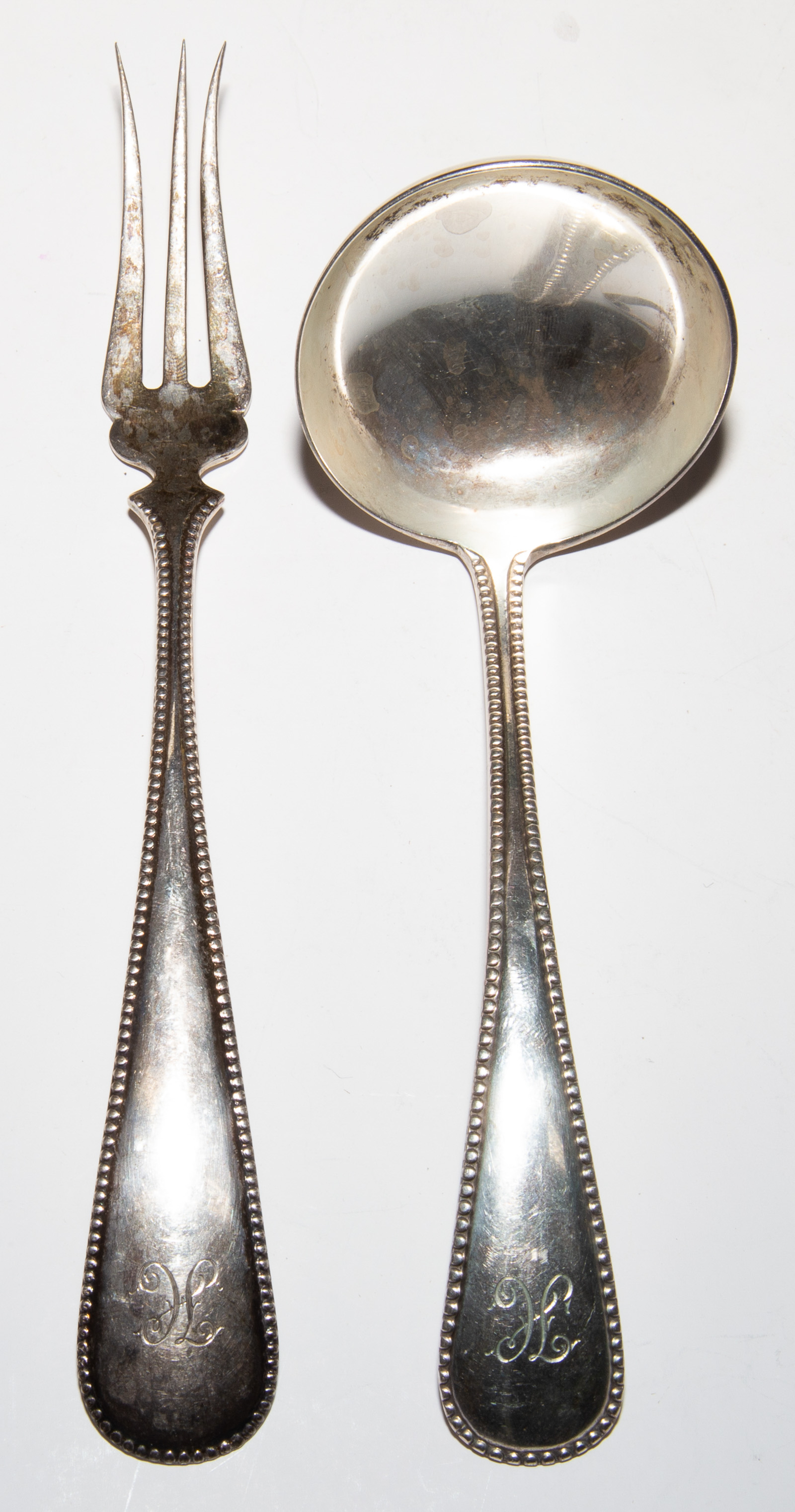 Appraisal: DUTCH SILVER SAUCE LADLE LEMON FORK Fork has date letter