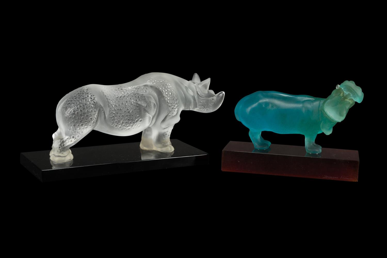 Appraisal: LALIQUE RHINOCEROS AND DAUM HIPPOPOTAMUS FIGURES Group of two crystal