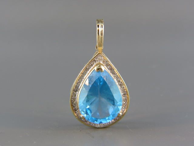 Appraisal: Blue Topaz Diamond Pendant rich pear shape gem weighing over