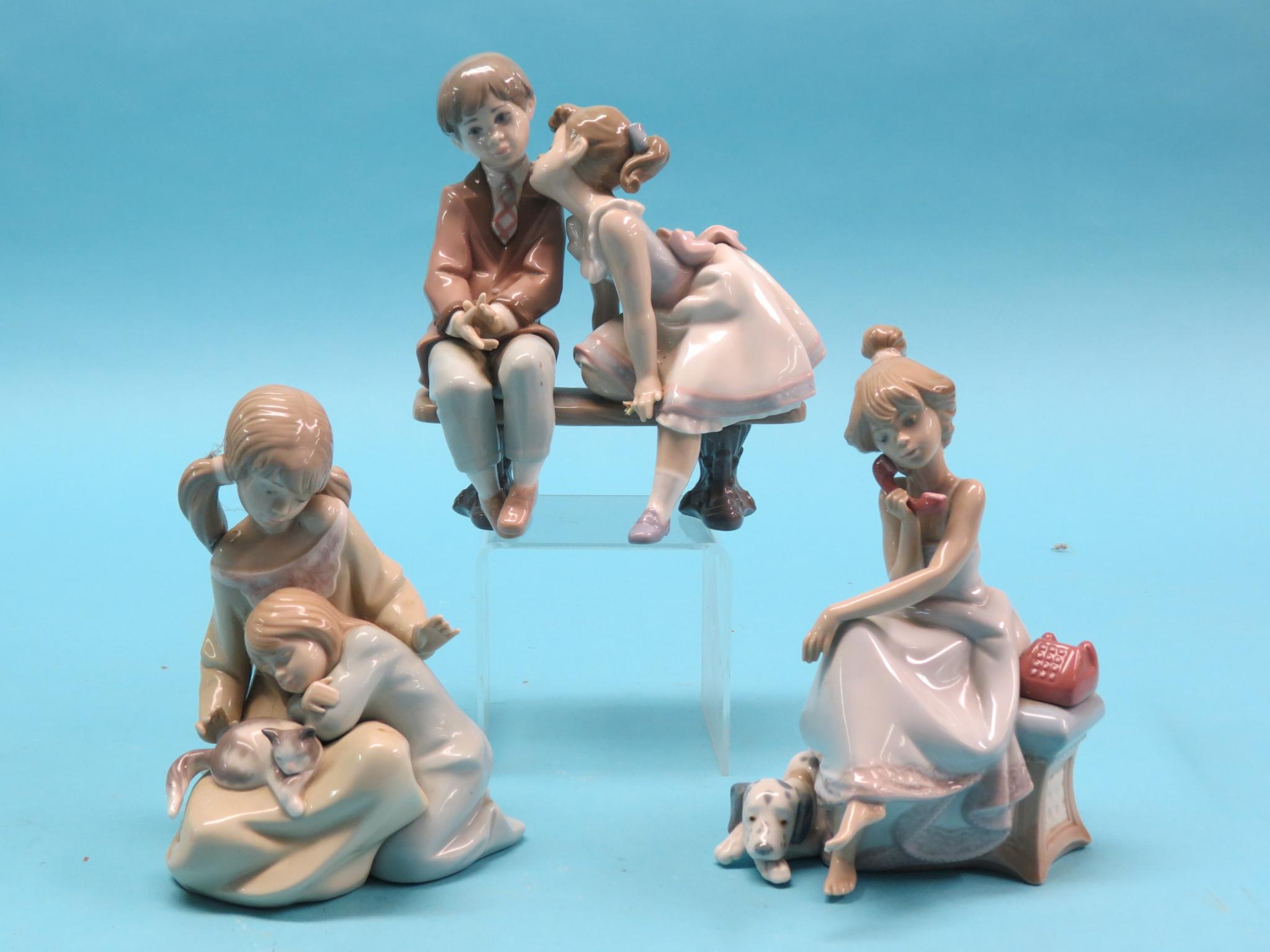 Appraisal: Lladro figures including young boy and girl kissing total tallest