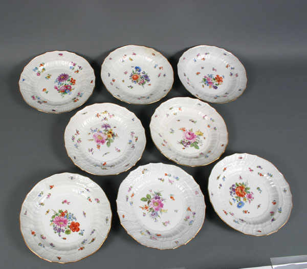 Appraisal: Eight Meissen porcelain deep plates hand painted with flowers and