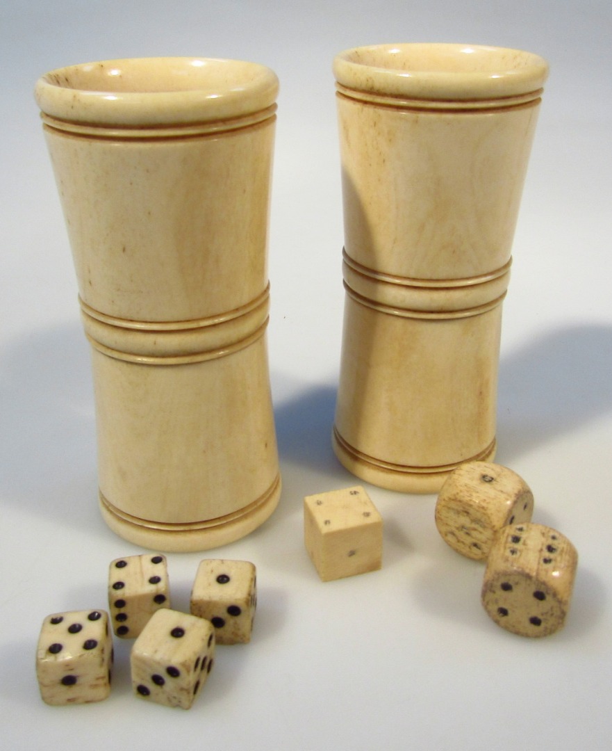 Appraisal: A thC dice shaker of inverted circular form with a