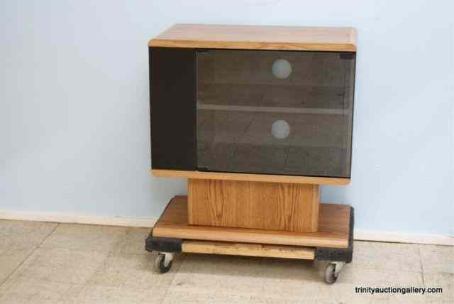 Appraisal: Oak Veneer TV Entertainment StandNice television stand with glass fronted