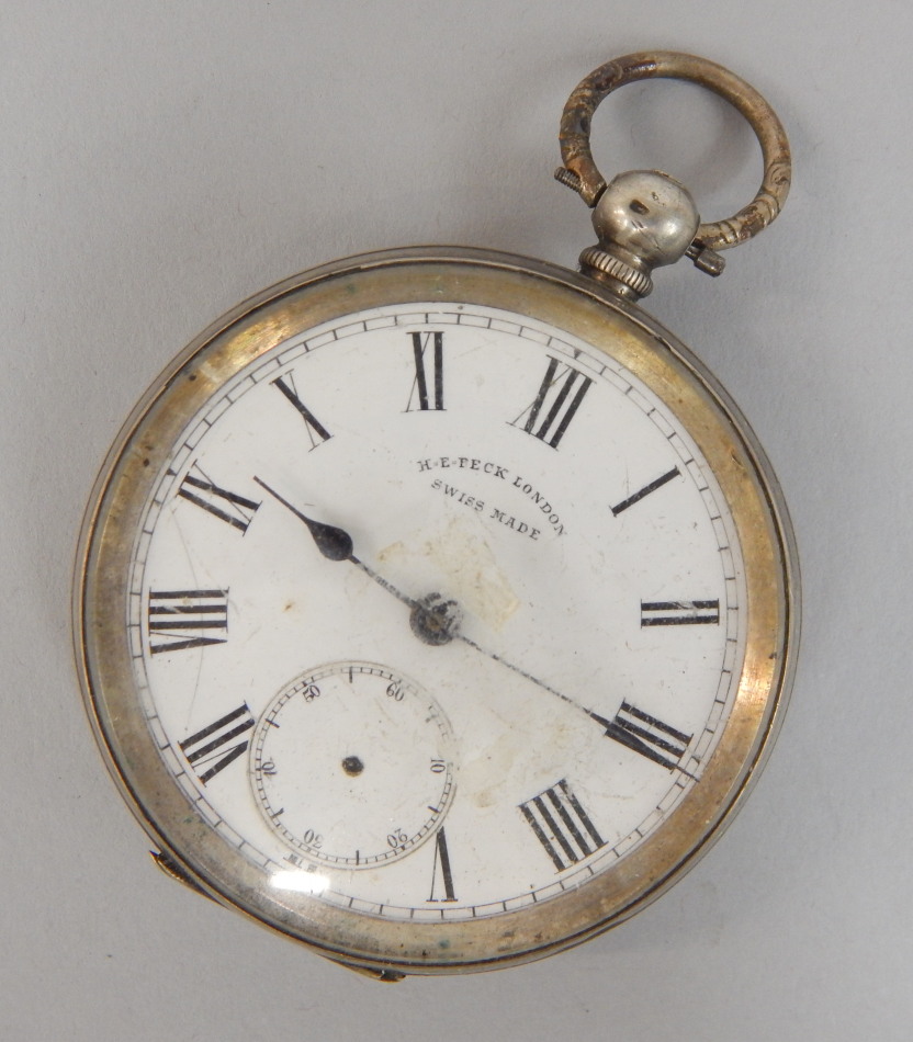 Appraisal: A continental white metal pocket watch the enamel dial stamped