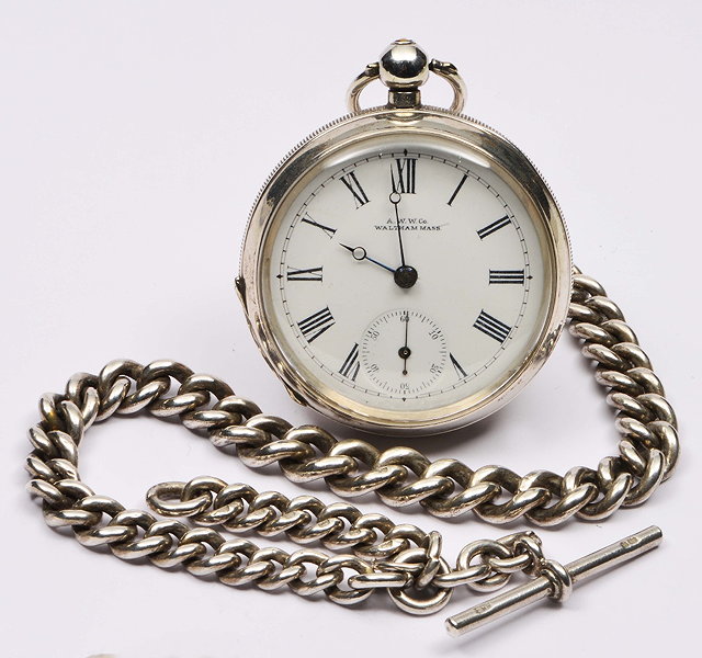 Appraisal: Silver pocket watchby Waltham with enamel dial and engine turned