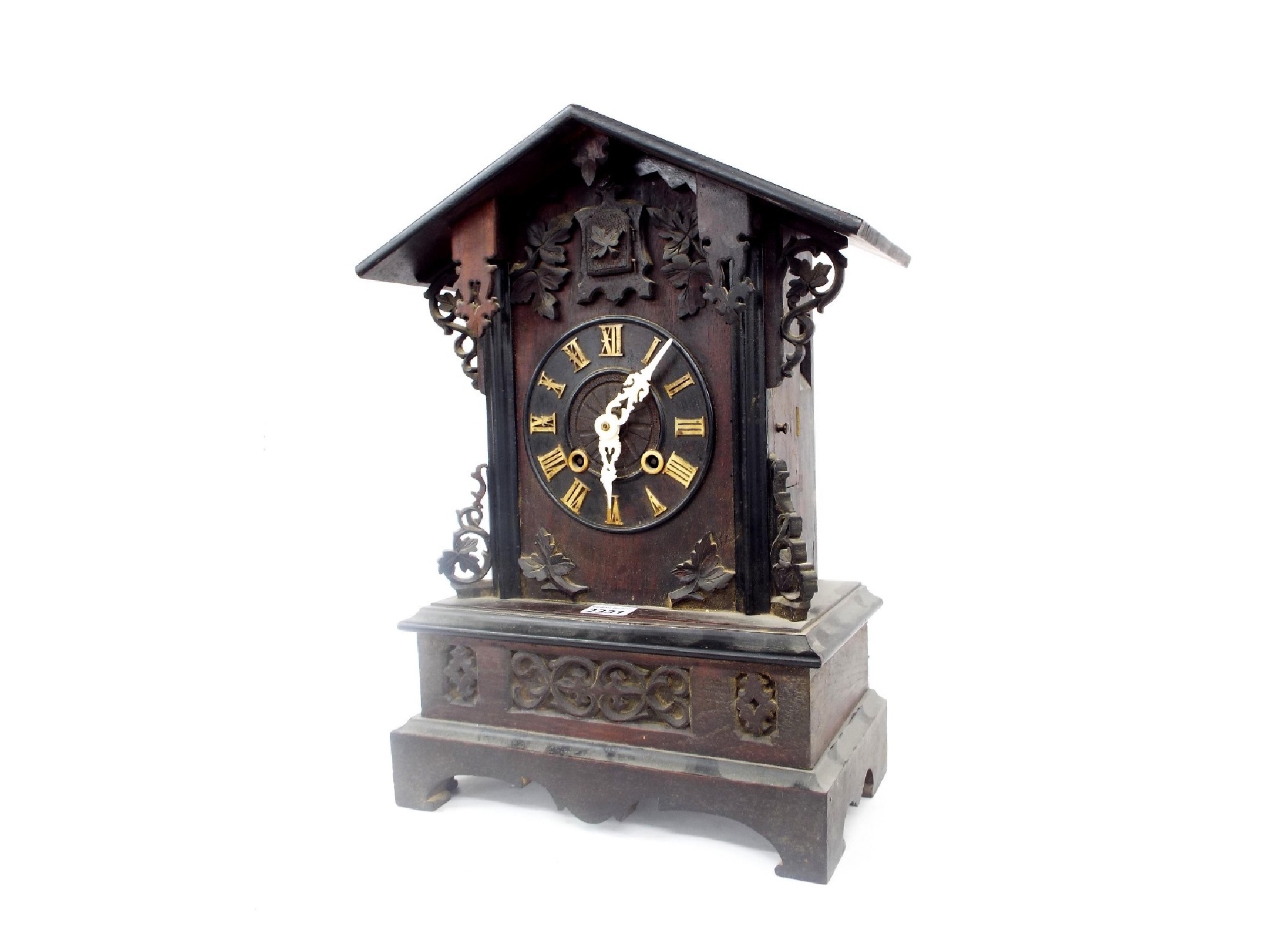 Appraisal: Black Forest two train cuckoo mantel clock the dial within