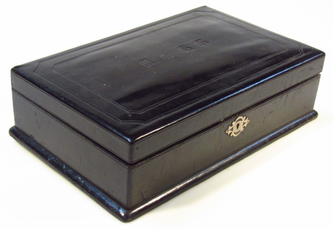 Appraisal: An Edwardian vanity box the black lacquered rectangular outline initialled