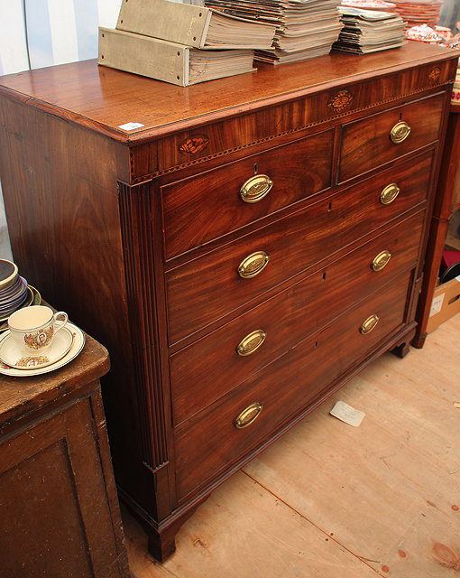 Appraisal: A GEORGE III MAHOGANY CHEST OF TWO SHORT AND THREE