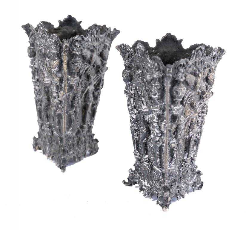 Appraisal: A PAIR OF CONTINENTAL CAST SILVER ORNATE MINIATURE VASES of