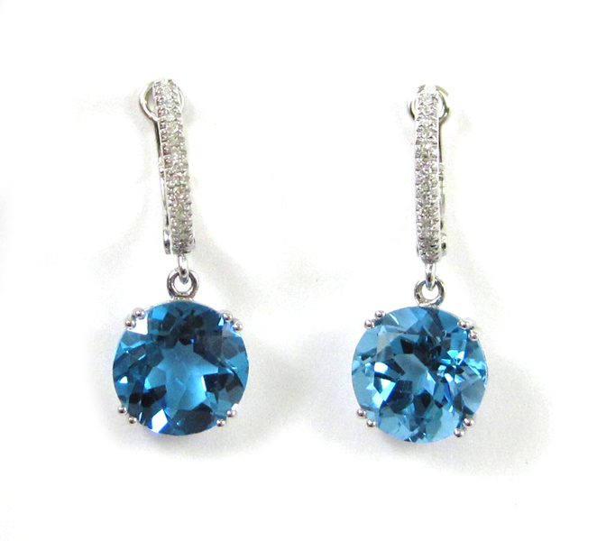 Appraisal: PAIR OF BLUE TOPAZ AND DIAMOND EARRINGS each k white