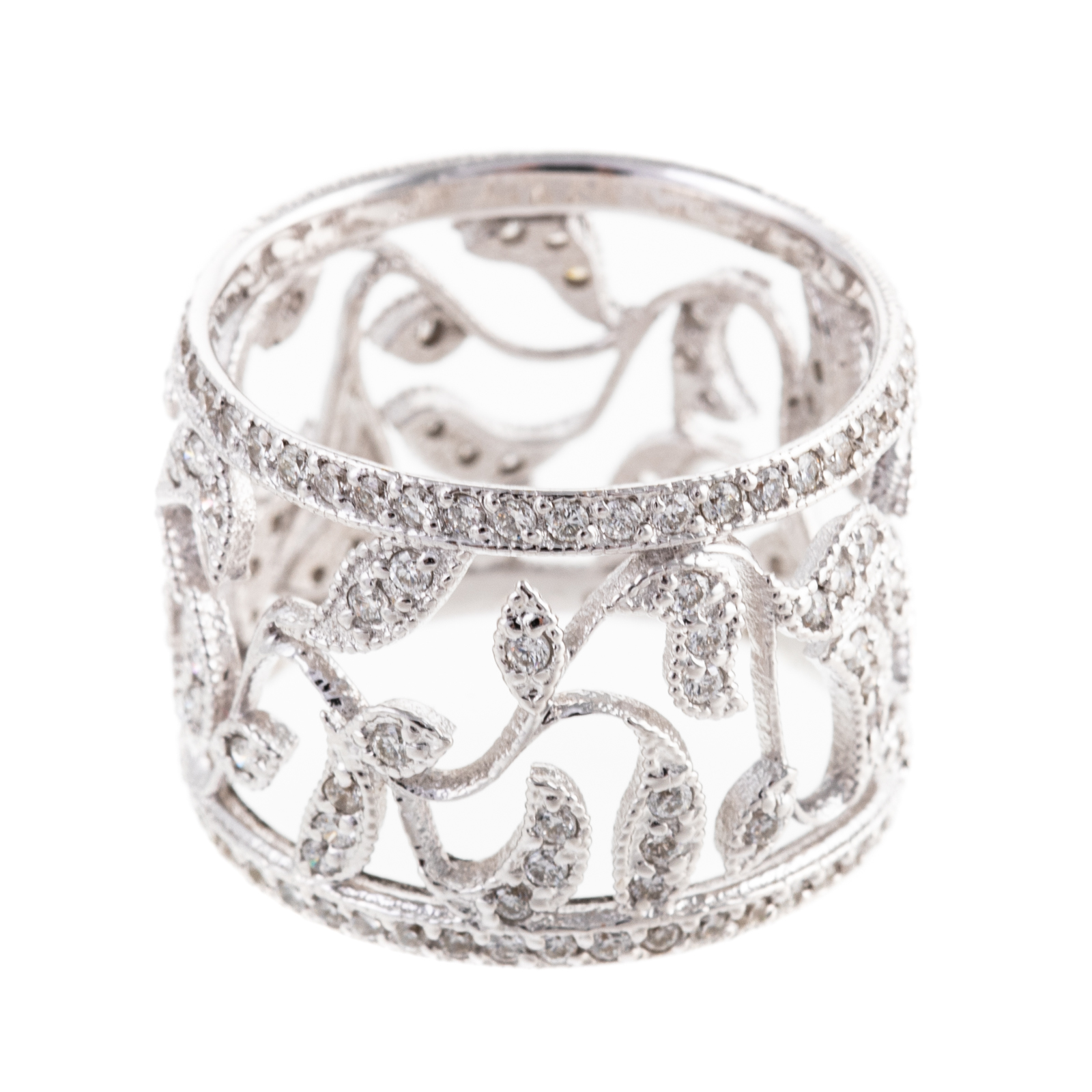 Appraisal: A WIDE DIAMOND FILIGREE BAND IN K K white gold