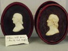 Appraisal: PAIR MINIATURE WAX BAS RELIEF BUST PORTRAITS - Two elderly