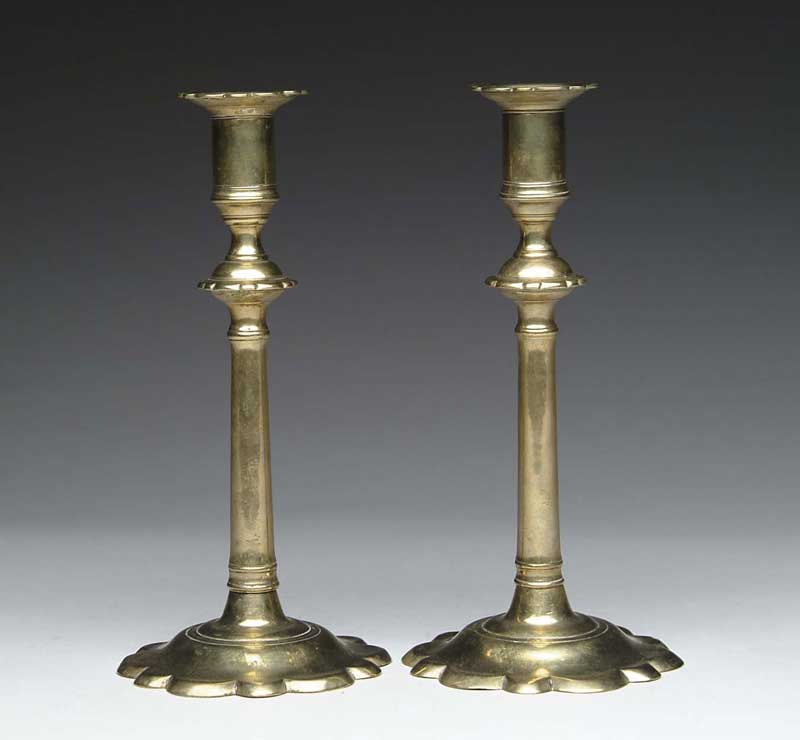 Appraisal: FINE PAIR OF QUEEN ANNE PETAL BASE CANDLESTICKS Turned shaft