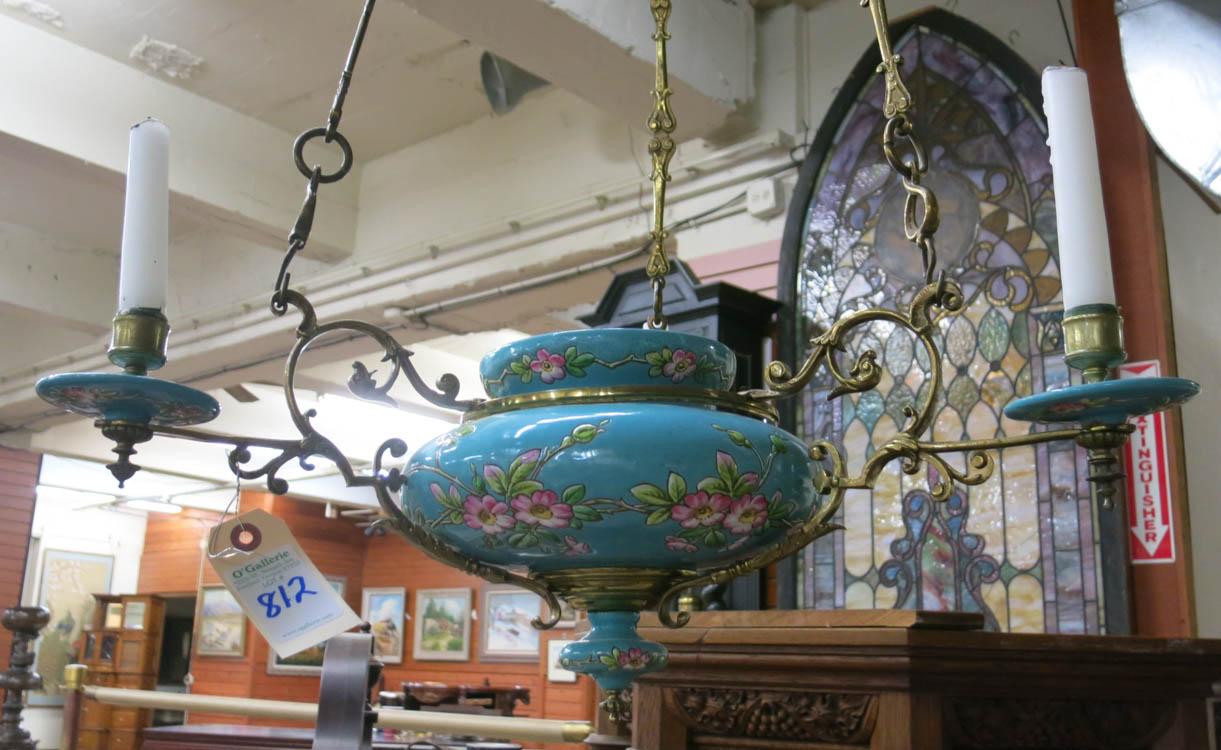 Appraisal: VICTORIAN MAJOLICA AND BRASS CANDLESTICK CHANDELIER centering a lead-glazed earthenware