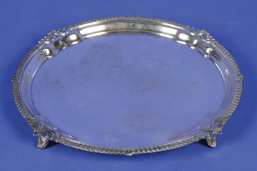 Appraisal: A GEORGE V SALVER of circular form with a raised