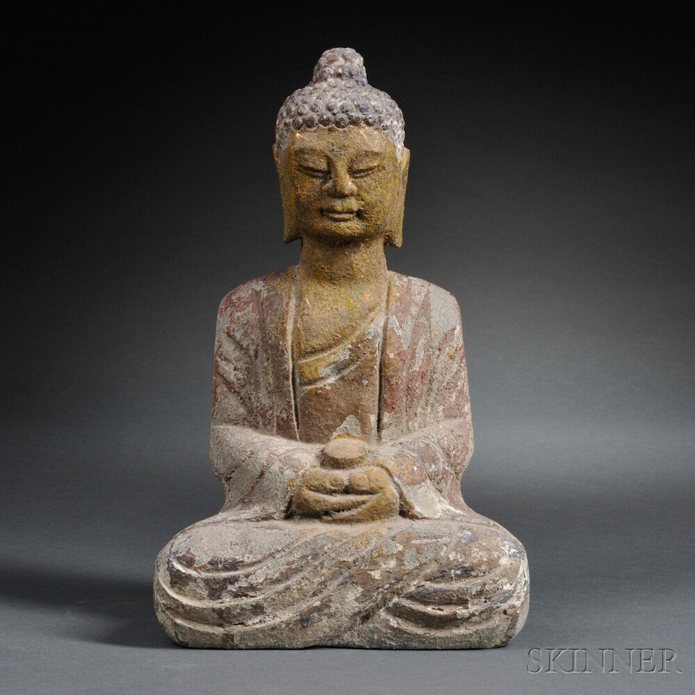 Appraisal: Polychrome Stone Buddha Southeast Asia with tightly coiled hair and