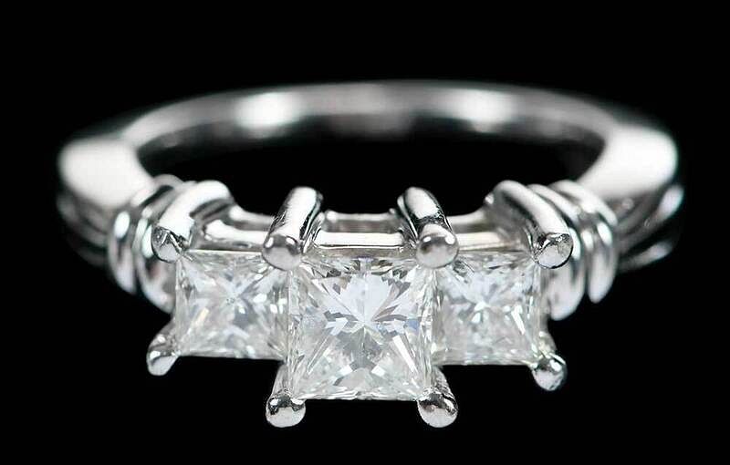 Appraisal: Platinum Diamond Ring three stone ring center princess cut diamond