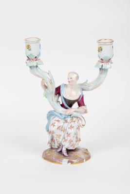 Appraisal: A Meissen figural two-light candelabrum circa modelled as a lady