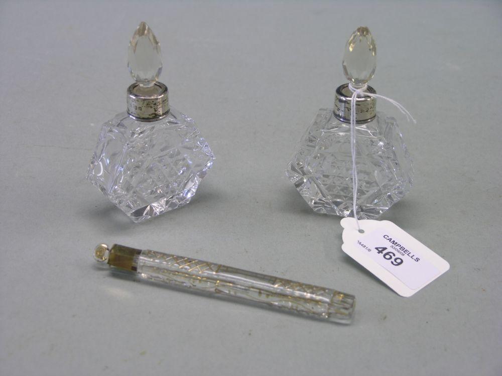 Appraisal: A gilded glass scent bottle cylindrical shape with stopper in