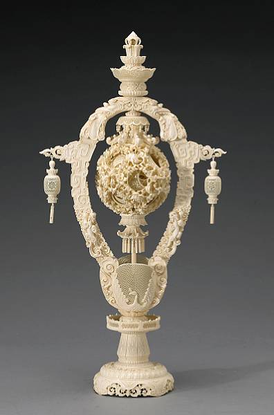 Appraisal: A large pieced ivory puzzle ball and stand th Century